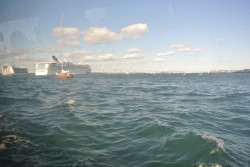 Norwegian Gem and Caribbean Princess in the distance near bridge off of coast of Newport Rhode Island.jpg